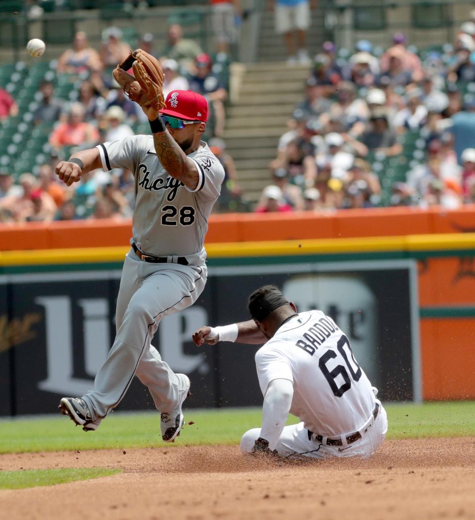 Detroit Tigers left fielder Akil Baddoo slides safely into second base ahead of the tag by Chicago White Sox second baseman Leury Garcia in the first inning at Comerica Park in Detroit, Sunday, July 4, 2021.