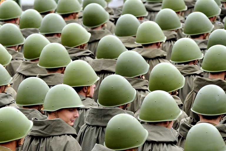 Belarussian solders march past during an Independence Day parade in Minsk. Belarussian police fired tear gas, beat up activists and arrested dozens Sunday to thwart a major opposition protest in Minsk against the rule of authoritarian President Alexander Lukashenko