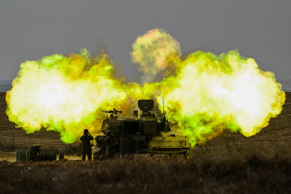 An IDF Artillery solider covers his ears as a shell is fired towards Gaza on October 11, 2023 near Netivot, Israel. Israel has sealed off Gaza and conducted airstrikes on Palestinian territory after an attack by Hamas killed hundreds and took more than 100 hostages. On October 7, the Palestinian militant group Hamas launched a surprise attack on Israel from Gaza by land, sea, and air, killing over 700 people and wounding more than 2000. Israeli soldiers and civilians have also been taken hostage by Hamas and moved into Gaza. The attack prompted a declaration of war by Israeli Prime Minister Benjamin Netanyahu.