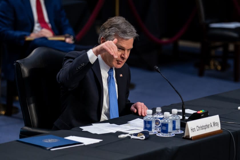 WASHINGTON, DC - MARCH 02: FBI Director Christopher Wray speaks during a Senate Judiciary Committee hearing on Capitol Hill on Tuesday, March 2, 2021 in Washington, DC. In his first public testimony since President Biden took office in January, Director Wray testified to senators that violent extremists motivated by racial anti-governmental ideology have emerged as the biggest domestic terrorism threat. (Kent Nishimura / Los Angeles Times)