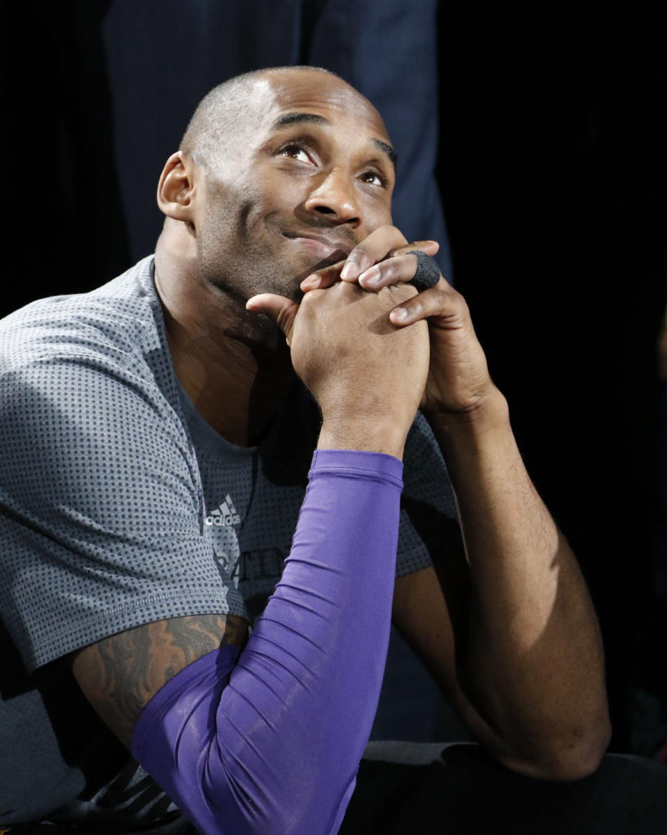 Kobe Bryant #24 of the Los Angeles Lakers watches tribute at AT&T Center on February 6, 2016 in San Antonio, Texas.