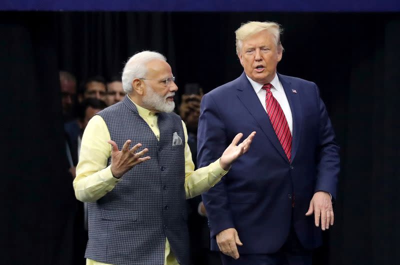 FILE PHOTO: U.S. President Donald Trump and India's Prime Minister Narendra Modi participate in the "Howdy Modi" event in Houston