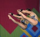 Canadian Roseline Filion (L) and Meaghan Benfeito make their routine in the women´s 10m synchronised platform competition during the XVI Pan American Games Guadalajara 2011 in Guadalajara, Mexico, on October 27, 2011. AFP PHOTO / RODRIGO BUENDIA (Photo credit should read RODRIGO BUENDIA/AFP/Getty Images)