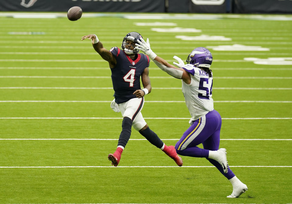 Houston Texans quarterback Deshaun Watson (4) throws over Minnesota Vikings middle linebacker Eric Kendricks (54) during the second half of an NFL football game Sunday, Oct. 4, 2020, in Houston. (AP Photo/David J. Phillip)