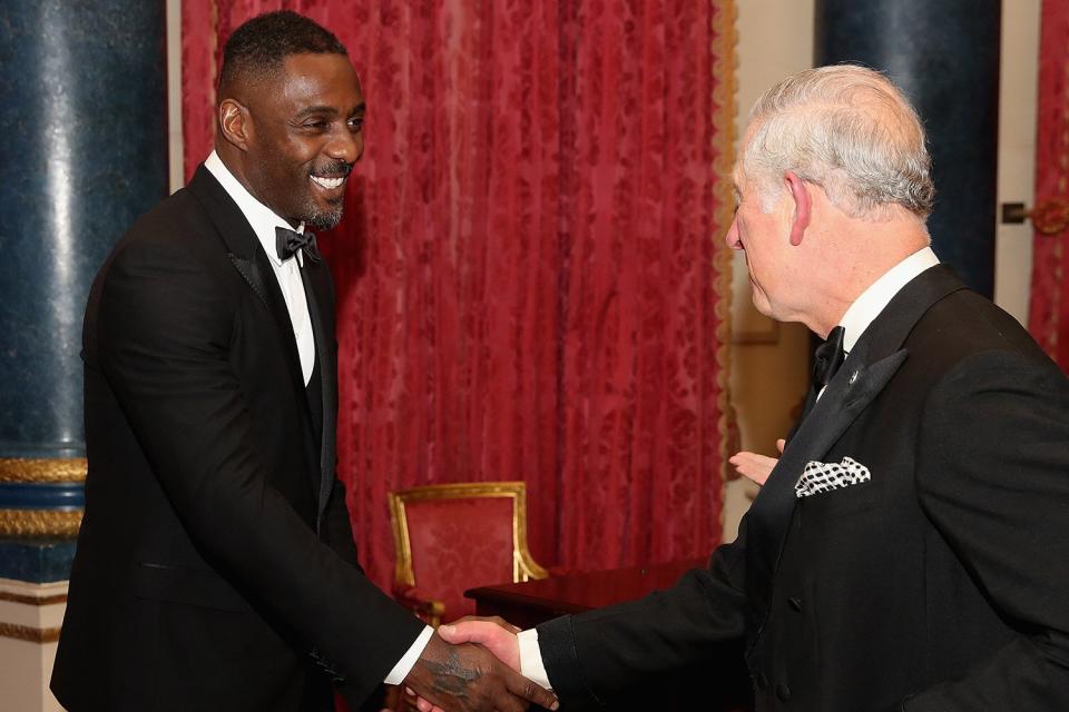 Prince Charles, Prince of Wales chats to actor Idris Elba as he hosts the 'One Million Young Lives' dinner