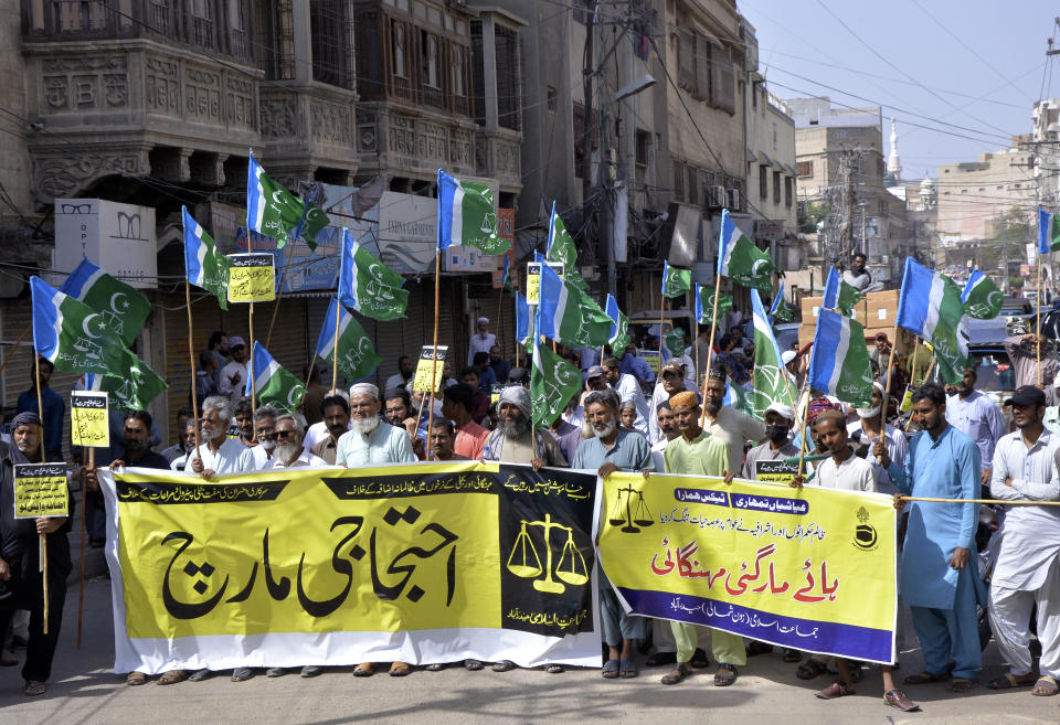 Supporters of Jamaat-e-Islami chant anti-Pakistan government during a strike against inflation in Hyderabad, Pakistan, Saturday, Sept. 2, 2023. Pakistani traders on Saturday went on strike against the soaring cost of living, including higher fuel and utility bills and record depreciation of the rupee against the dollar, which has led to widespread discontent among the public. (AP Photo/Pervez Masih)