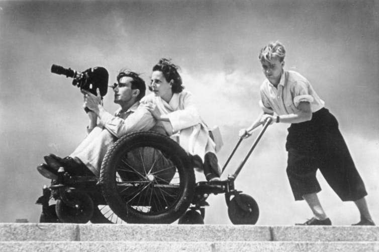 <span class="caption">Riefenstahl filming at the 1936 Olympics.</span> <span class="attribution"><span class="source">Bundesarchiv/Wikimedia</span></span>