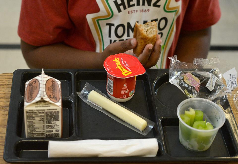 Typical lunch offerings in the Erie School District include, from left: chocolate milk, cheese sticks, yogurt, celery and whole grain bread, shown here, Oct. 8, 2021, at Joanna Connell Elementary School in Erie. School meal rules have reverted to what they were before the coronavirus pandemic. Families who are eligible based on income levels are required to apply for their children to receive free or reduced-price lunches. Schools, including the Erie School District, in predominantly low-income areas will be allowed to serve breakfast and lunch to everyone for free, as before.