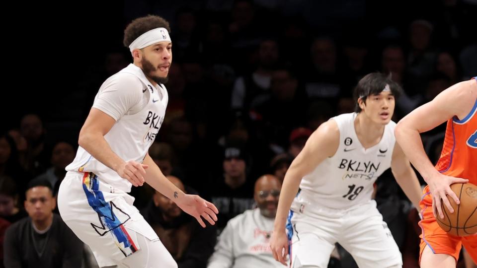 Jan 15, 2023; Brooklyn, New York, USA; Oklahoma City Thunder guard Josh Giddey (3) controls the ball against Brooklyn Nets guard Seth Curry (30) and forward Yuta Watanabe (18) and guard Kyrie Irving (11) during the first quarter at Barclays Center. Mandatory Credit: Brad Penner-USA TODAY Sports