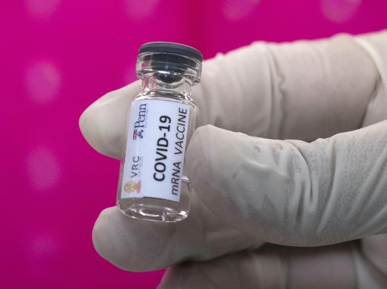 <span class="caption">A lab technician holds a vial of a COVID-19 vaccine candidate during testing at the Chula Vaccine Research Center, run by Chulalongkorn University in Bangkok, Thailand on May 25, 2020. </span> <span class="attribution"><span class="source">(AP Photo/Sakchai Lalit)</span></span>