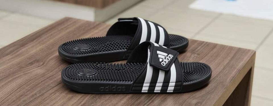 Adidas slides on a table