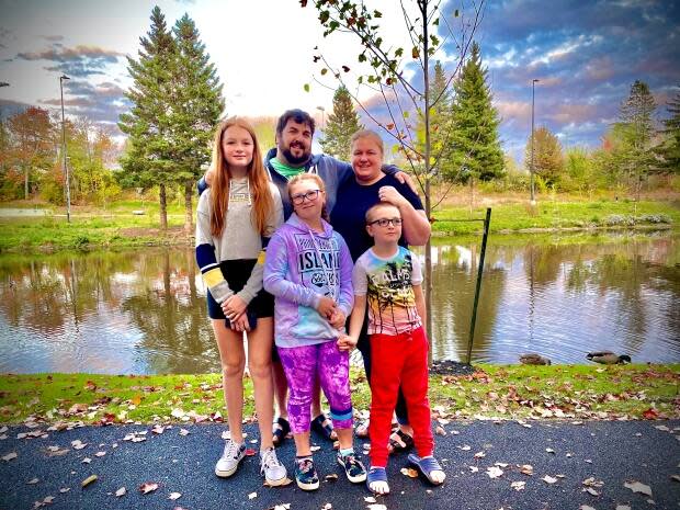 Andy Scott, centre, with wife Sandra and their children, from left, Savannah, Alexis and Reuben. Scott's three children were all at school during the lockdown on Thursday.