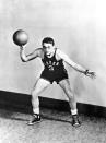 <p>James Dean strikes a pose with a basketball, circa 1945.</p>