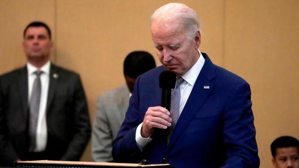 PHOTO: President Biden bows his head in a moment of silence for the three American troops killed Sunday, Jan. 28, 2024, in a drone strike in northeast Jordan, while speaking at the 'Sunday Lunch' at the Brookland Baptist Banquet Center on Jan. 28, 2024. (Jacquelyn Martin/AP)