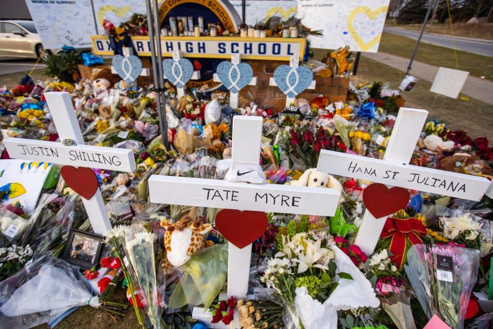 A memorial at an entrance to Oxford High School in Michigan on Dec. 7, 2021, for the four students killed. Six other students and a teacher were also wounded.