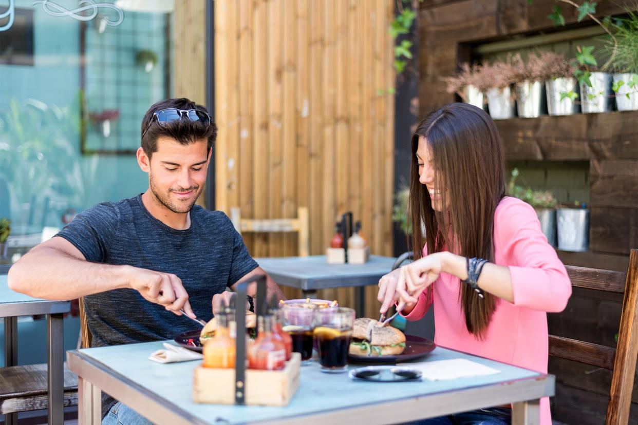 Couple eating at restaurant