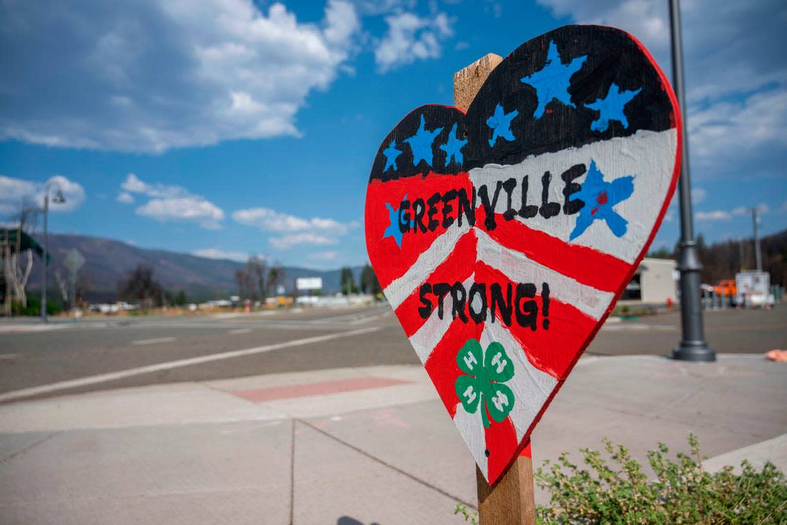 A sign that reads “Greenville Strong!” is seen in downtown Greenville on Thursday, July 28, 2022, a year after the Dixie Fire devastated the community.