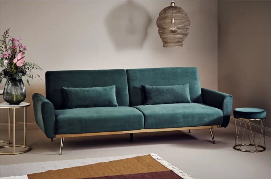 Emerald green sofa