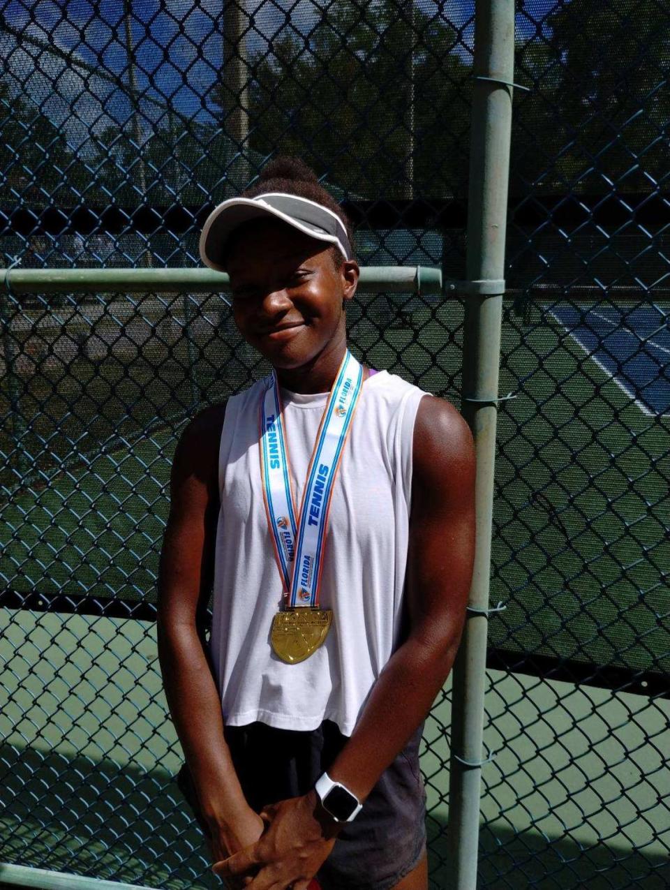 Braden River freshman Chukwunoneeru Smarty poses with her gold medal after winning the FHSAA Class 3A individual girls tennis state championship in Altamonte Springs on Thursday, May 2, 2024. Photo provided