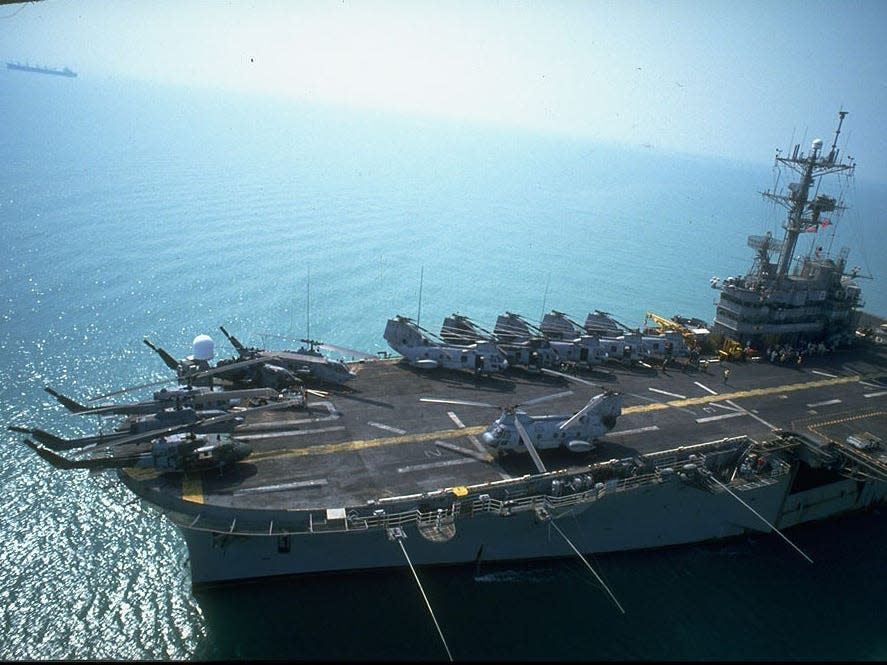 Aerial shot of USS Tripoli during a deterrence exercise.
