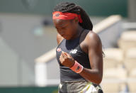 United States's Coco Gauff celebrates after winning a point against Tunisia's Ons Jabeur during their fourth round match on day 9, of the French Open tennis tournament at Roland Garros in Paris, France, Monday, June 7, 2021. (AP Photo/Michel Euler)