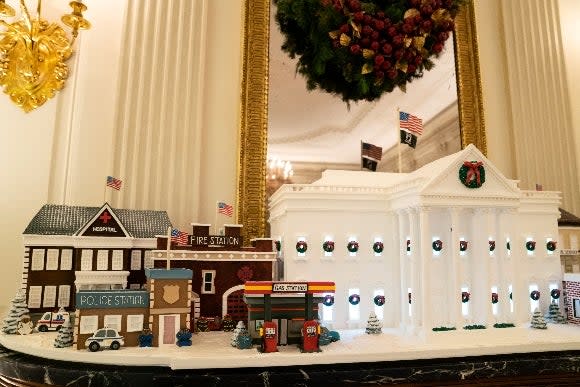 Gingerbread houses sit in the East Room of the White House