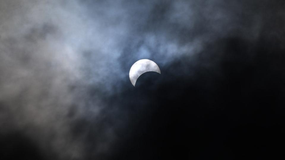 <div>The moon begins to eclipse the sun during a total solar eclipse across North America, at Niagara Falls State Park in Niagara Falls, New York, on April 8, 2024. (Photo by ANGELA WEISS / AFP) (Photo by ANGELA WEISS/AFP via Getty Images)</div>