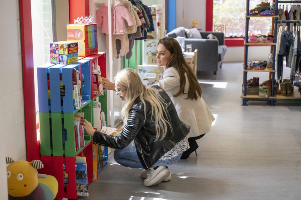 The Duchess of Cambridge with a young mum called Sara during a visit to Little Village’s hub in Brent to hear how the baby bank is supporting local families (Paul Grover/Daily Telegraph/PA) (PA Wire)