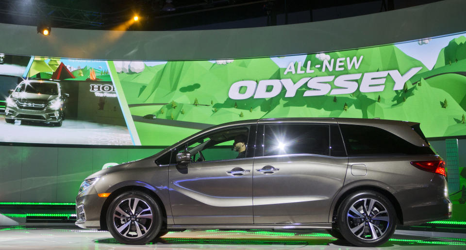 FILE - In this Jan. 9, 2017, file photo, a new Honda Odyssey minivan is unveiled at the North American International Auto Show, in Detroit. Honda recorded a 6.7% decline in July-September profit as vehicle and motorcycle sales slipped and an unfavorable exchange rate hurt earnings at the Japanese automaker, Honda Motor Co. reported Friday, Nov. 8, 2019. (AP Photo/Tony Ding, File)