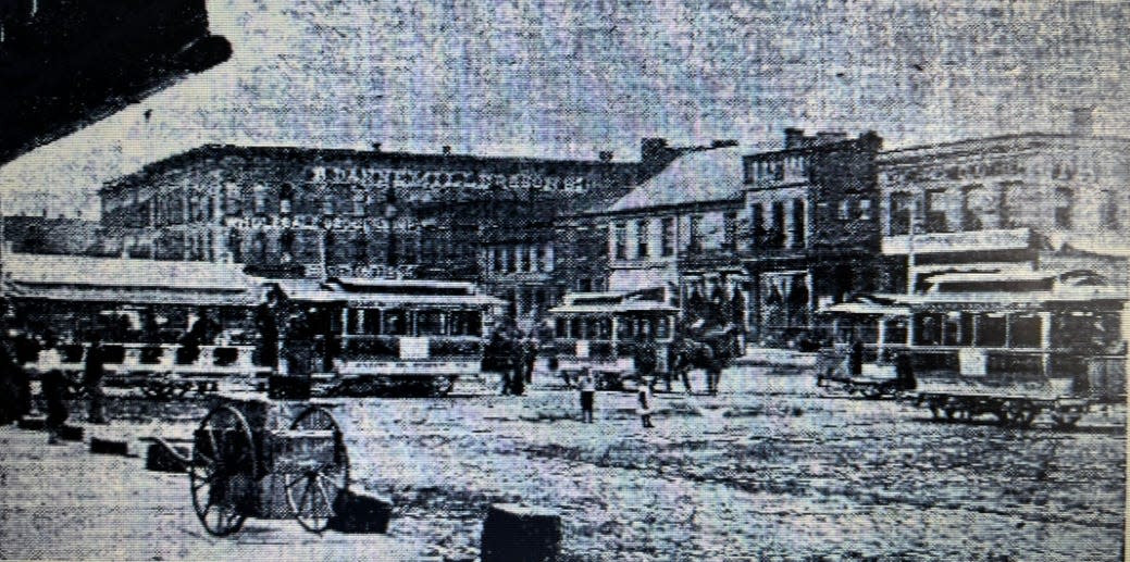 This historical photograph, published in The Sunday Repository in 1923, pictured Canton Public Square not long after a city directory was published in 1870. The Dannemiller Block and horse cars had been added in the years between 1870 and when this picture was taken.