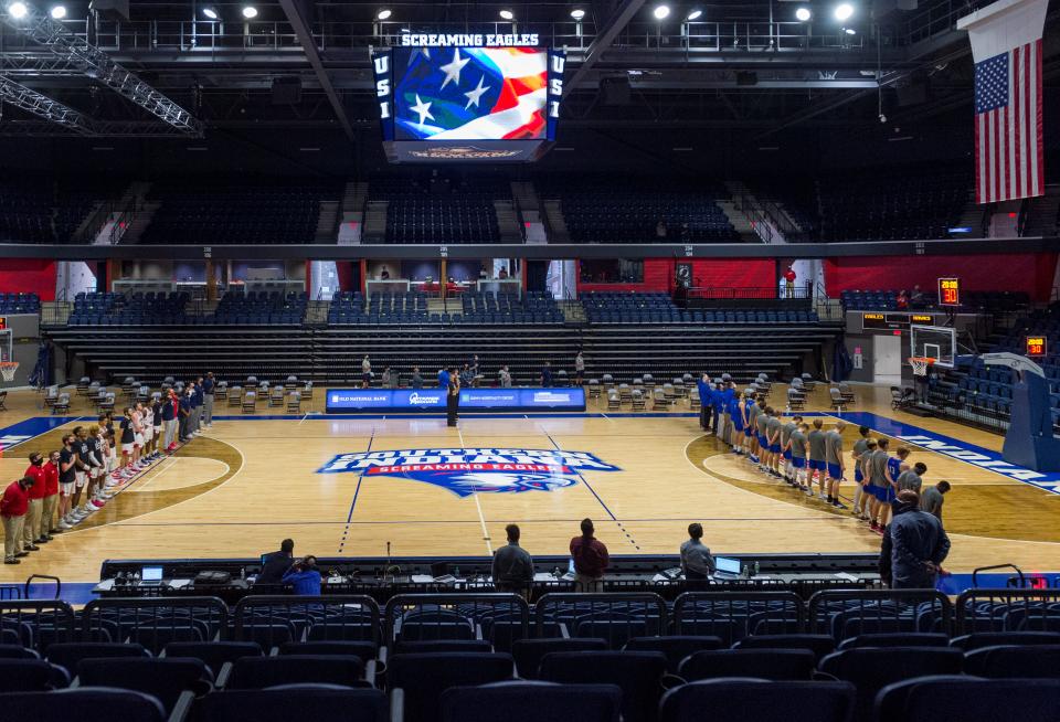 The Pledge of Allegiance is played ahead of the University of Southern Indiana Screaming Eagles vs Rockhurst Hawks game at Screaming Eagles Arena in Evansville, Ind., Friday afternoon, Nov. 27, 2020. Fans were not allowed in attendance due to COVID-19 precautions. 