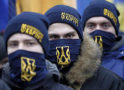 <p>Members of nationalist groups march to mark the third anniversary of the Maidan protests in Kiev, Ukraine, Feb. 22, 2017. (AP Photo/Sergei Chuzavkov) </p>