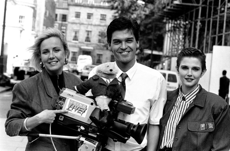 Philip Schofield pictured in 1987 with his Going Live co-hosts Sarah Greene, puppet “Gordon the Gopher”, and resident fashion expert Annnabel Giles (PA)