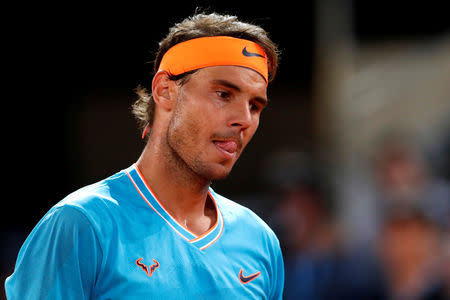 FILE PHOTO: Tennis - ATP 1000 - Madrid Open - The Caja Magica, Madrid, Spain - May 11, 2019 Spain's Rafael Nadal reacts during his semi final match against Greece's Stefanos Tsitsipas REUTERS/Susana Vera