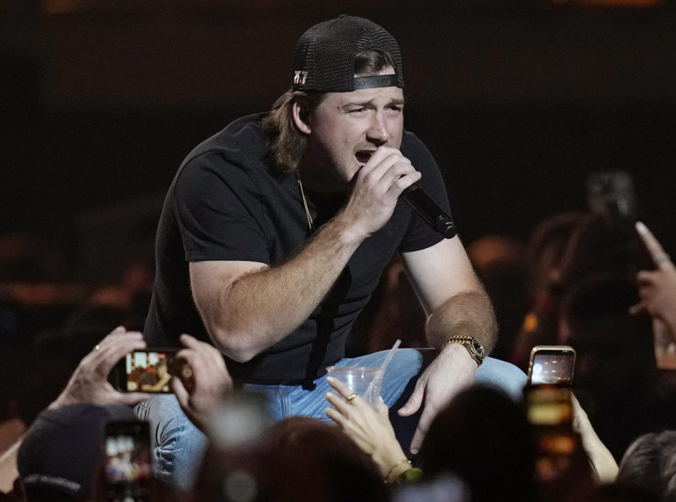 FILE - Morgan Wallen performs on the first night of the 2022 iHeartRadio Music Festival in Las Vegas on Sept. 23, 2022. Wallen's "Last Night" is one of AP's contenders for song of the summer. (AP Photo/John Locher, File)