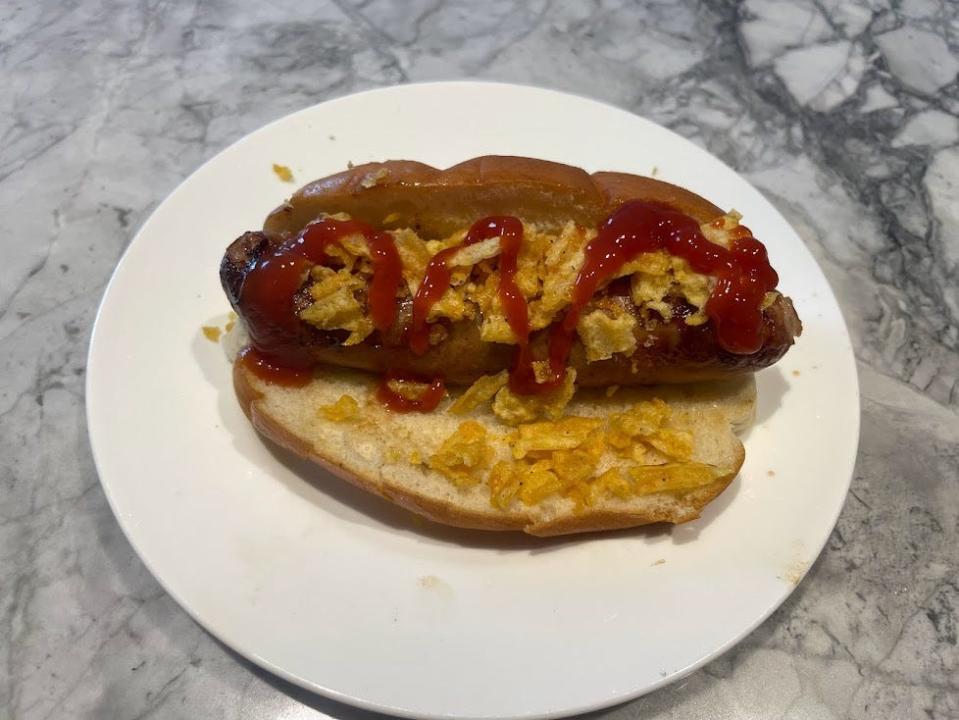 Unexpected-cheddar chicken sausage on a bun