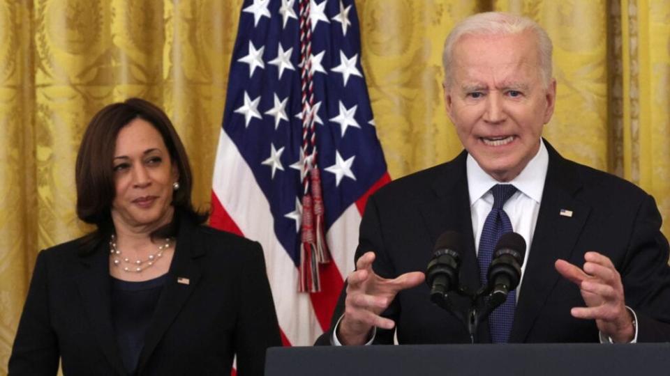 Vice President Kamala Harris (left) looks on as President Joe Biden (right) delivers remarks before a recent signing ceremony for the COVID-19 Hate Crimes Act in the East Room of the White House. (Photo by Anna Moneymaker/Getty Images)