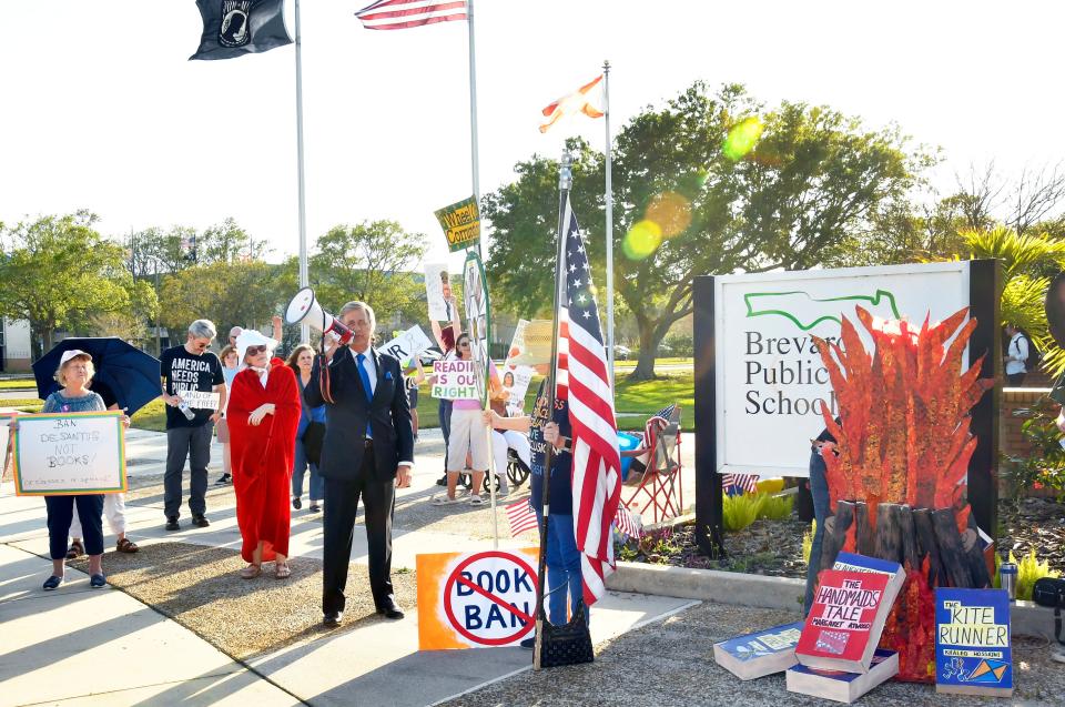 A few dozen people gathered outside before the March 7 meeting at the Brevard County School Board in Viera to protest various issues, including the banning of books.