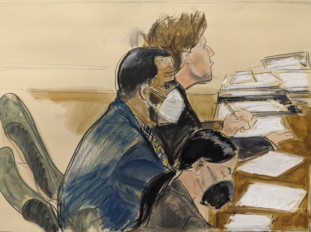 In this courtroom artist’s sketch R. Kelly, left, listens during his trial in New York, Thursday, Aug. 26, 2021. (AP Photo/Elizabeth Williams)