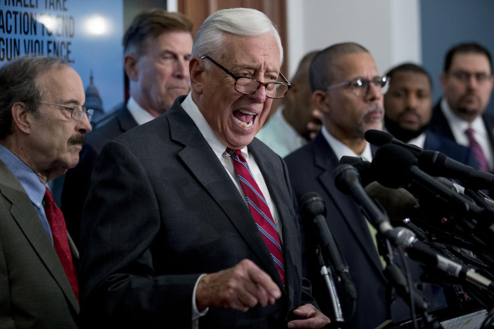 House Majority Leader Steny Hoyer of Md., center, accompanied by Rep. Eliot Engel, D-N.Y., left, Rep. Don Beyer, D-Va., second from left, Rep. Anthony Brown, D-Md., fourth from left, and others, speaks at a news conference calling for Senate action on H.R. 8 - Bipartisan Background Checks Act of 2019 on Capitol Hill in Washington, Tuesday, Aug. 13, 2019. (AP Photo/Andrew Harnik)