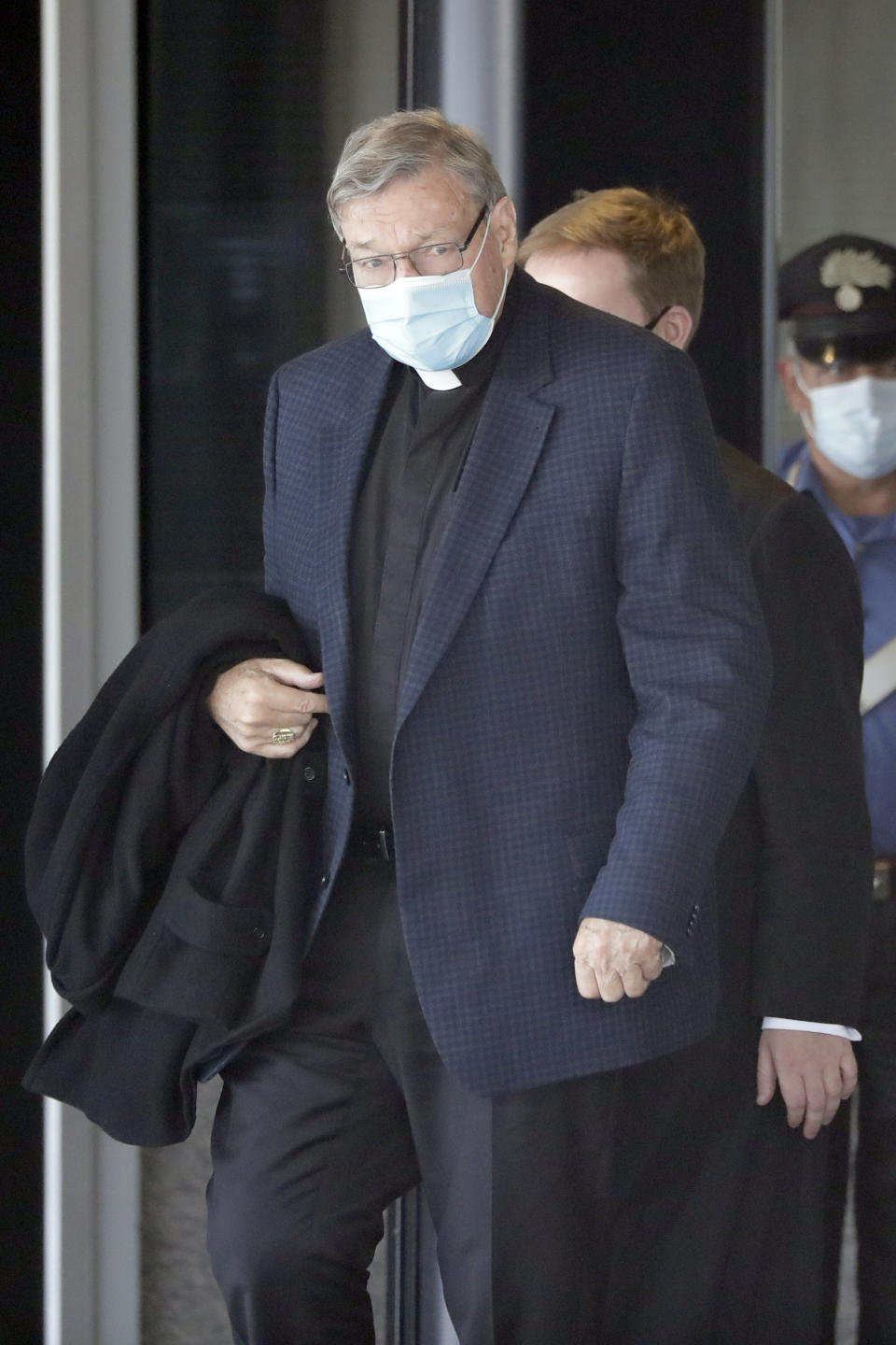 Australian Cardinal George Pell arrives at Rome's international airport in Fiumicino, Wednesday, Sept. 30, 2020. Pell took a leave of absence from his job in 2017 to stand trial in his native Australia on historic child sexual abuse charges, for which he was ultimately acquitted. (AP Photo/Andrew Medichini)