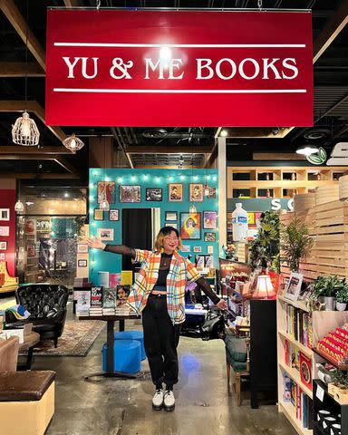 <p>Yu and Me Books/ Instagram</p> Yu & Me Books owner Lucy Yu at the store's temporary location on the Lower East Side