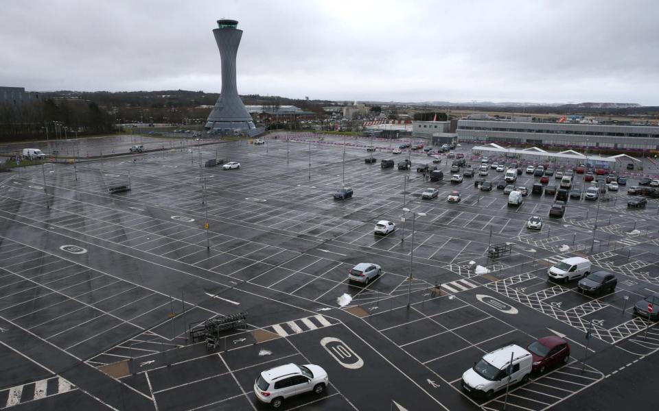 Edinburgh airport on the first day that travellers flying directly into Scotland on international flights have to self-isolate for 10 days in a quarantine hotel room -  Andrew Milligan/PA