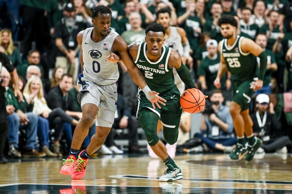 Michigan State's Tyson Walker, right, moves the ball after stealing it from Penn State's Kanye Clary, left, during the first half on Thursday, Jan. 4, 2024, in East Lansing.