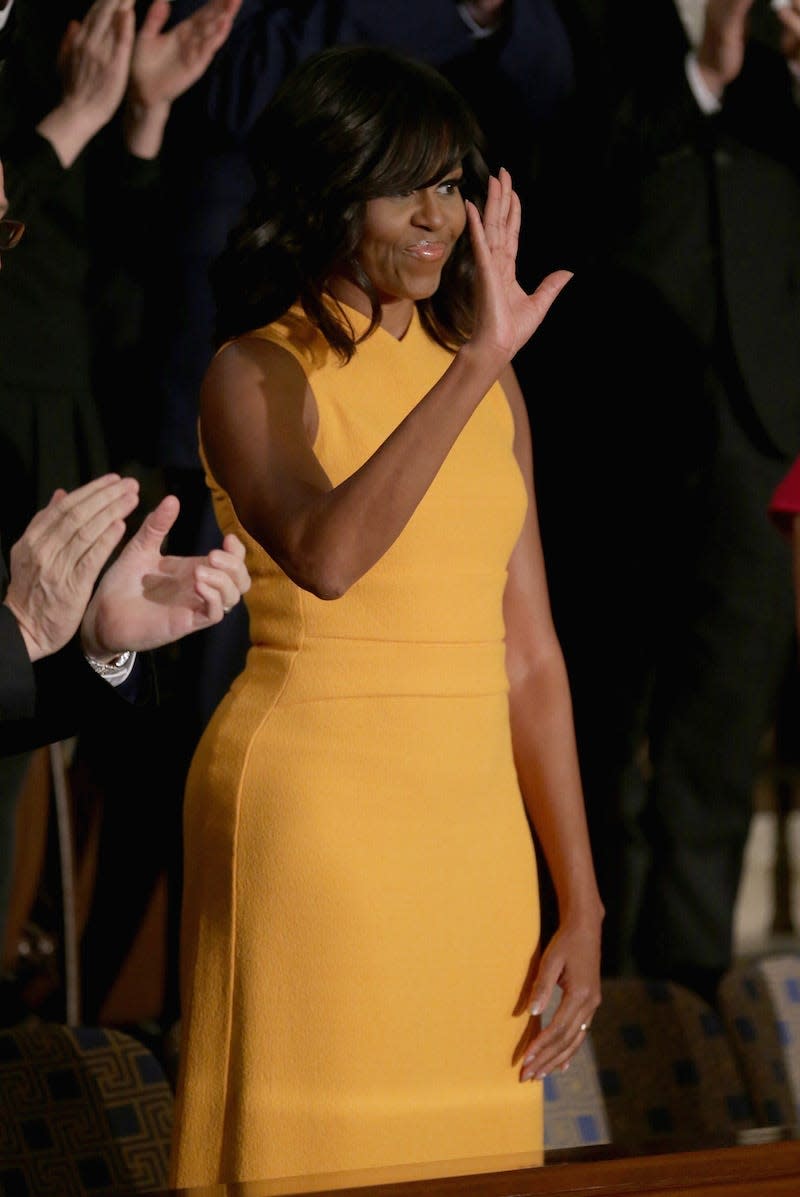 Michelle Obama wears a yellow dress at the 2016 State of the Union.