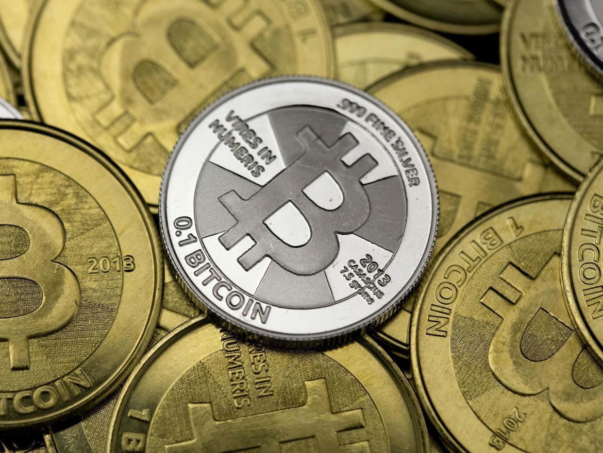 Some of Bitcoin enthusiast Mike Caldwell's coins are pictured at his office in this photo illustration in Sandy, Utah, January 31, 2014: Reuters