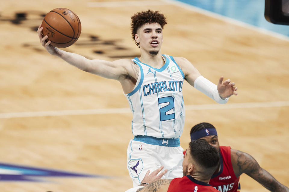 Charlotte Hornets guard LaMelo Ball (2) drives to the basket during the second half of an NBA basketball game against the New Orleans Pelicans, Sunday, May 9, 2021, in Charlotte, N.C. (AP Photo/Brian Westerholt)