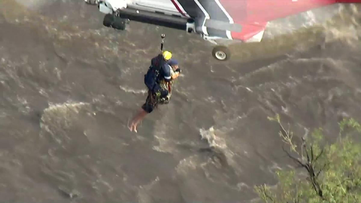 Helicopter Crew In La Rescues Man From River