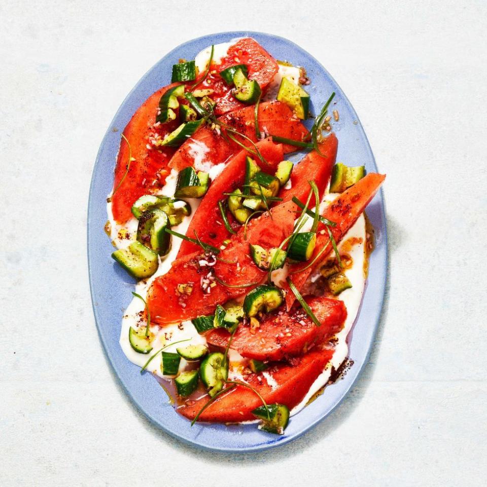 <p>Searching for a unique and refreshing side dish? Look no further than this watermelon salad paired with feta, cucumber and mint. </p><p>Get the<strong><a href="https://www.goodhousekeeping.com/food-recipes/a36720702/watermelon-salad-with-feta-recipe/" rel="nofollow noopener" target="_blank" data-ylk="slk:Watermelon Salad with Feta recipe;elm:context_link;itc:0;sec:content-canvas" class="link "> Watermelon Salad with Feta recipe</a></strong>. </p>