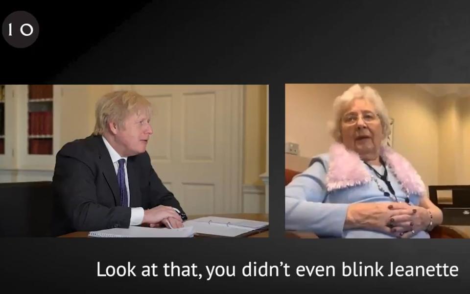 Screen grab dated from Twitter/@Boris Johnson of Downing Street issued film of the Prime Minister watching Jeanette, a 97-year-old care home resident receiving her first dose of the vaccine - Downing Street/Twitter/PA